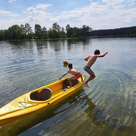 Przy Jeziorze Z Prywatna Plaza W Borach Tucholskich Alicja Wczasy Z Dziecmi Nowe Luksusowe Na Skraju Jeziora I Lasu Prázdninový dům