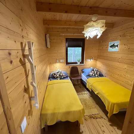 Przy Jeziorze Z Prywatna Plaza W Borach Tucholskich Alicja Wczasy Z Dziecmi Nowe Luksusowe Na Skraju Jeziora I Lasu Hébergement de vacances